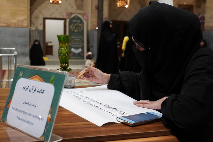 Photos: Calligraphy of Holy Qur’an by Pakistani pilgrim at Imam Reza Holy Shrine