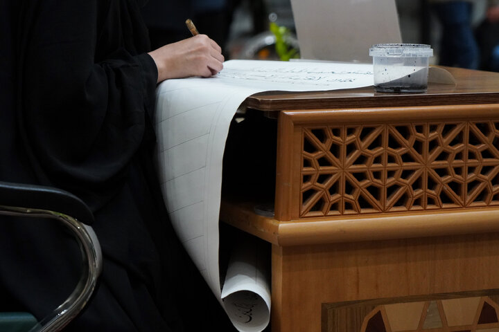 Photos: Calligraphy of Holy Qur’an by Pakistani pilgrim at Imam Reza Holy Shrine