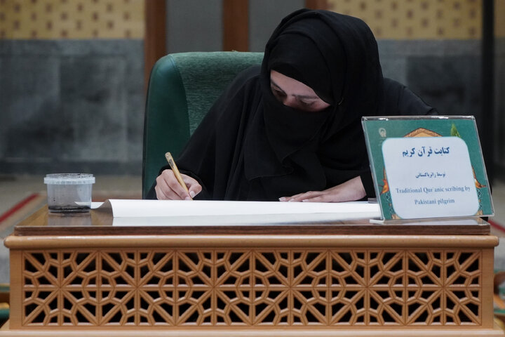 Photos: Calligraphy of Holy Qur’an by Pakistani pilgrim at Imam Reza Holy Shrine