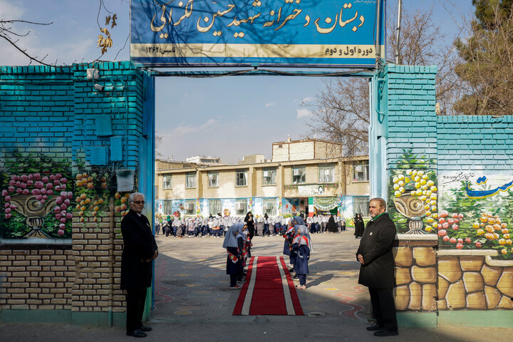 Photos: Distribution of jackets, cultural items by servants of Imam Reza holy shrine
