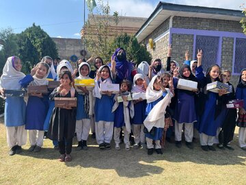 "Who is Hussain" Distributes Shoes to Underprivileged Students in Pakistan + Photos