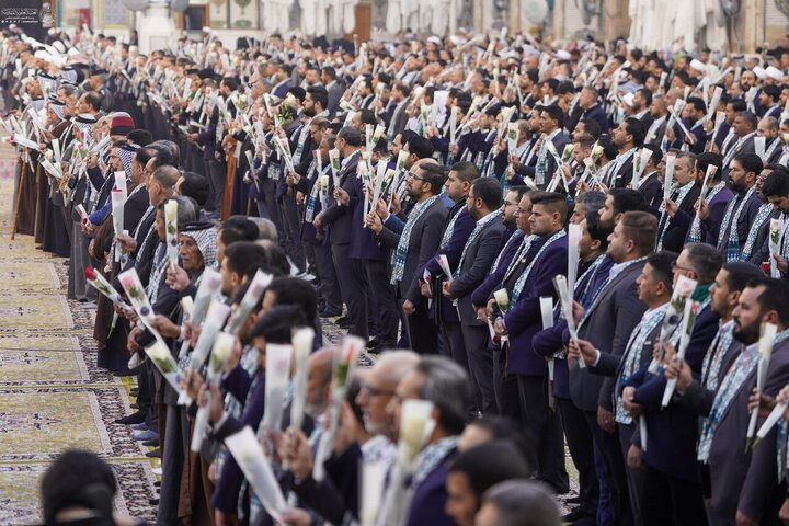 Informe fotográfico | La cúpula sagrada del Príncipe de los Creyentes se adorna con la bandera del aniversario del nacimiento de Imam Alí