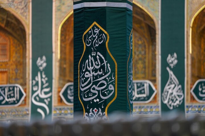 Informe fotográfico |Banderas alegres adornan el santuario alauí con motivo del aniversario del nacimiento del Imam Alí