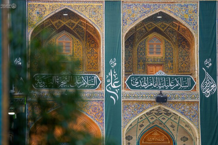 Informe fotográfico |Banderas alegres adornan el santuario alauí con motivo del aniversario del nacimiento del Imam Alí