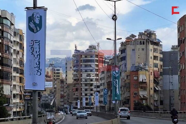 تقرير مصور/ نشر صور الحاج الشهيد قاسم سليماني في الضاحية الجنوبية لبيروت بمناسبة ذكرى سنويته
