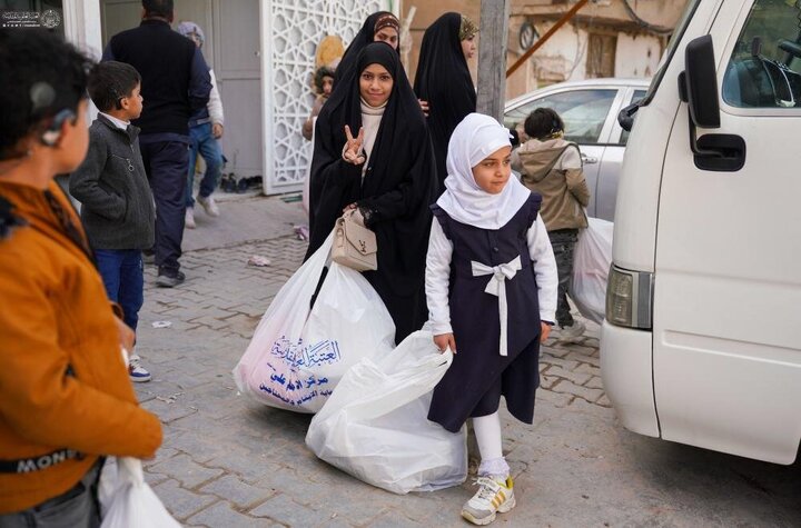 Informe fotográfico | Patrocinado por el Santuario de Amir al-Mu'minin, Imam Ali (PB): distribución de ropa de invierno y visita especial para alumnos del Instituto Al-Riyahin