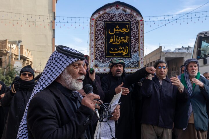 تقرير مصور/ تشييع النعش الرمزي للسيدة زينب (عليها السلام) عند العتبتين المقدستين في كربلاء