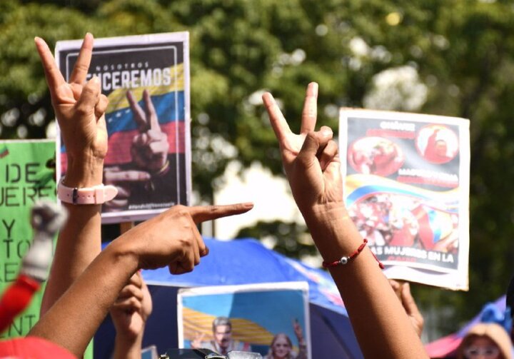 Informe fotográfico | Miles de venezolanos exigen con una gran marcha en Caracas la libertad de Maduro