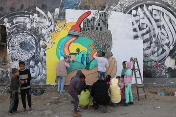 تصاویر | هنرمندان غزه و نقاشی امید بر ویرانه‌ها