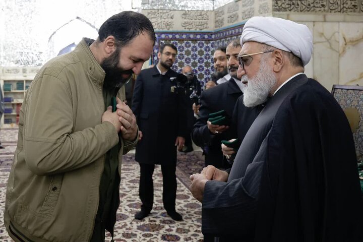 Photos: Dust-cleaning ceremony of Imam Reza holy shrine attended by families of martyrs of recent unrest