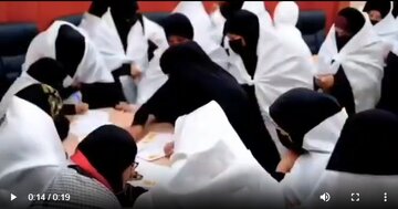 “Vîdeo | Rêzên jinên Iraqî yên Kifş-pêçandî (bi kefena şehîdan) ji bo tevlîbûna parêzvanên Îranê”