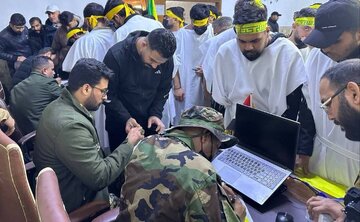 মার্কিন হুমকির বিরুদ্ধে ইরানের পাশে থাকার প্রস্তুতি ঘোষণা দিয়ে কাফন পরা ইরাকিরা