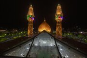 Scenes from dome, minarets of Aba al-Fadl al-Abbas Shrine on eve of 15th Sha'ban