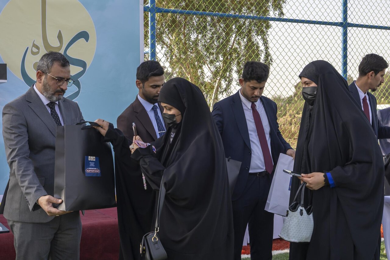 Al-Abbas Holy Shrine honors +350 female students wearing Iraqi abaya at Southern Technical University in Dhi Qar