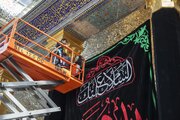 Courtyard Care Department displaying mourning banners in commemoration of martyrdom of Imam Al-Sadeq (+Photos)