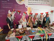 Photos: Activist of Ireland Palestine Solidarity Campaign Shares Awareness at Sinn Féin Ard Fheis in Belfast