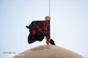 Photos: Hoisting Imam Hussain Mourning Flag at Hazrat Masoumeh Shrine