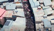 Video 2: Massive crowd carrying blood‑red flags of Revenge take part in symbolic funeral for martyred Leader in Kargil, India