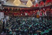 تقرير مصور/ مشاركة ألف طالب في المسيرة العاشورائية السنوية في كربلاء المقدسة