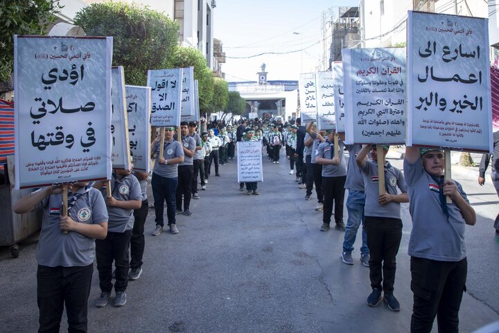 تقرير مصور/ بمشاركة نحو ألف طالب تنظيم المسيرة العاشورائية السنوية في كربلاء المقدسة