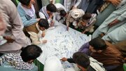 Photos: Afghans Sign Petition for Reopening of Shia Institutions