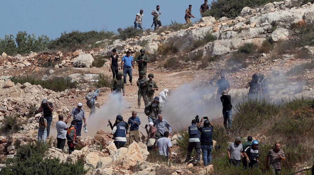 Israeli Settlers Attack Palestinian Municipal Workers, Destroy Farm in Central West Bank
