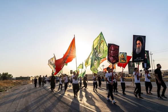 تقرير مصور/ قوافل الزائرين تنطلق من محافظة نينوى شمال العراق باتجاه كربلاء المقدسة