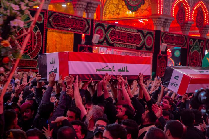 تقرير مصور/ تشييع حاشد لشهداء "الحشد" وصلاة على جثامينهم في حرم الإمام الحسين(ع)
