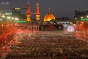 Photos: Crowds of mourners paint a condolence board in Karbala on night of َArbaeen