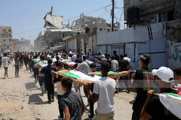 Informe fotográfico | Sepultan en Gaza los cuerpos de 112 mártires