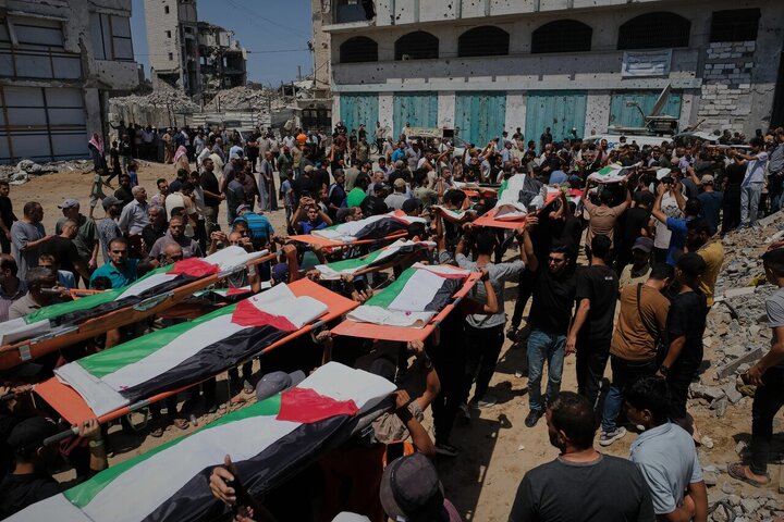 Photos: Mass Funeral for 112 Palestinians Held in Gaza