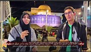 ABNA Reporters Ali and Zainab File from Najaf to Karbala Path at Night amid War as Pilgrims Carry Red Flags of Resistance