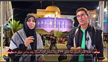 ABNA Reporters Ali and Zainab File from Najaf to Karbala Path at Night amid War as Pilgrims Carry Red Flags of Resistance