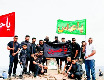 Photos: Raising Flag of Imam Hussain at highest peak in South Wales "Pen Y Fan"