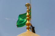 Photos: Green flag raised over Hazrat Masoumeh shrine