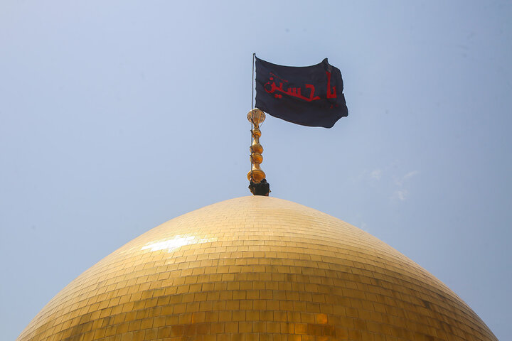 Photos: Green flag raised over Hazrat Masoumeh shrine