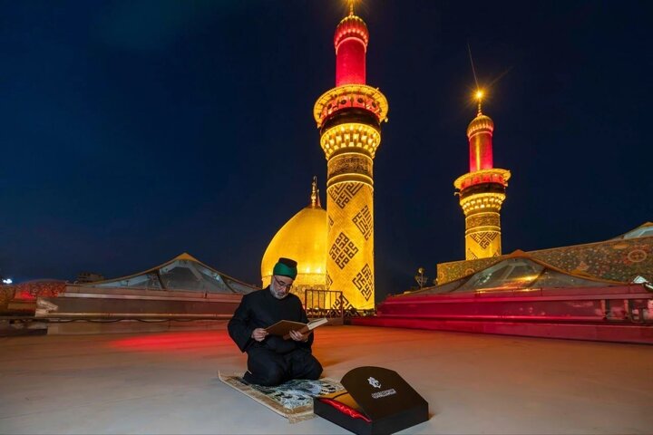 گزارش تصویری/ تعویض پرچم حرم امام حسین و حضرت عباس(علیهما السلام)
