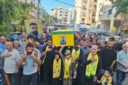 تقرير مصور/ مشاركة حشد كبير من الناس بتشييع شهيدين للمقاومة الاسلامية في الضاحية الجنوبية