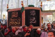 تقرير مصور/ تشييع النعش الرمزي للإمام الحسن العسكري (ع) عند العتبتين المقدستين بكربلاء