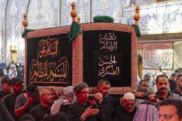 تقرير مصور/ تشييع النعش الرمزي للإمام الحسن العسكري (ع) عند العتبتين المقدستين بكربلاء
