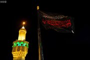 Photos: Mourning Flag Raised at Imam Ali Holy Shrine to Mark Martyrdom of Imam Hasan al-Askari (A.S.)