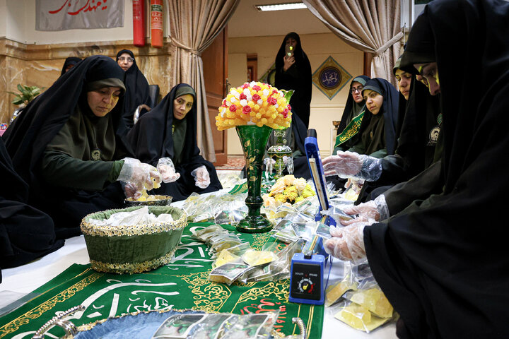 Photos: "Table of Blessing and Dignity" at Imam Reza Holy Shrine