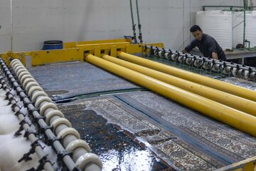 Washing carpets and furnishings at sites of Holy Shrine of Hazrat Abbas and its departments