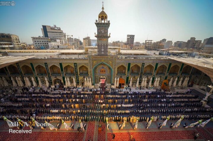 برافراشتن پرچم میلاد پیامبر اکرم(ص) در حرم مطهر علوی