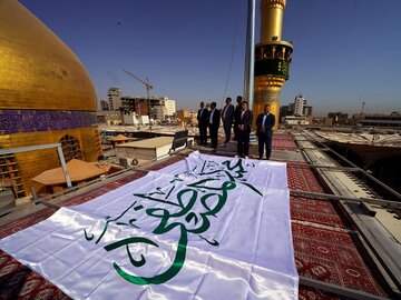 Flag-Raising Ceremony at Holy Shrine of Imam Ali Marks Start of Two Sadiqs Week