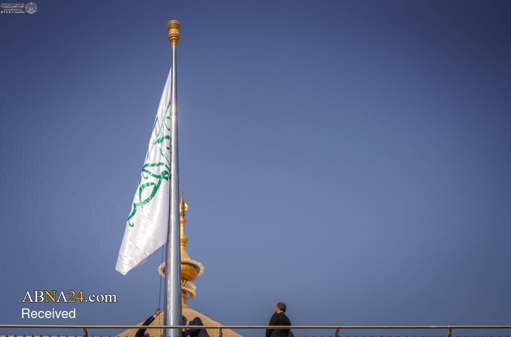 Photos: Prophet Muhammad's (PBUH) birthday flag raised at Holy Shrine of Imam Ali