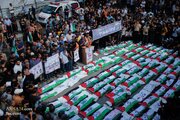 Photos: Funeral ceremony for 100 Palestinian martyrs in Gaza