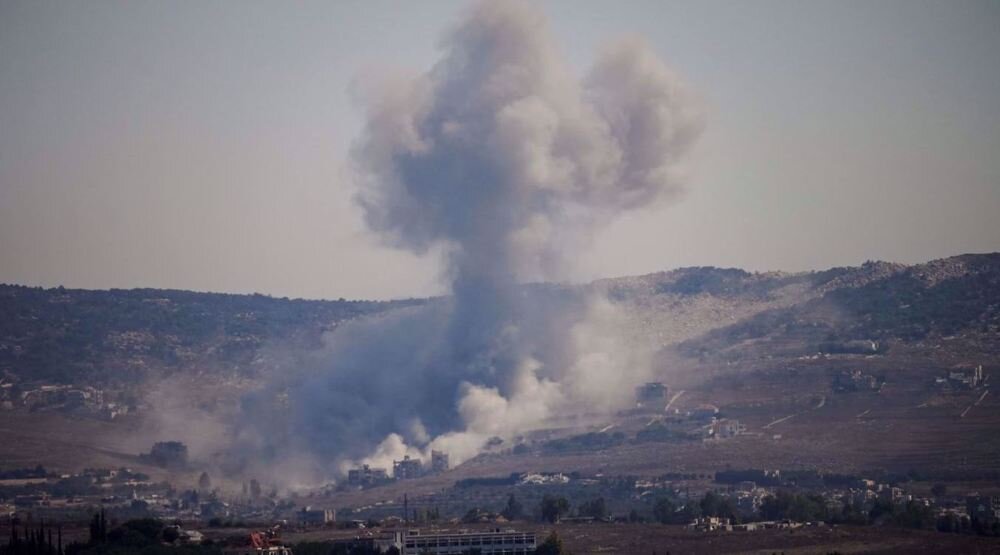 Israel strikes southern Lebanon, killing 13 including six children