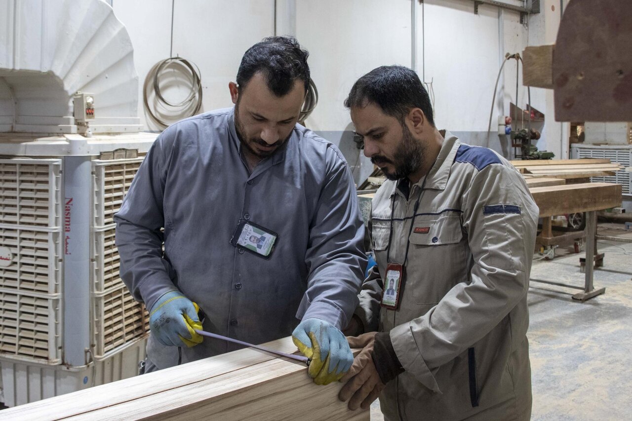 fabricating a new door for the sanctuary of the shrine of Aba al-Fadl