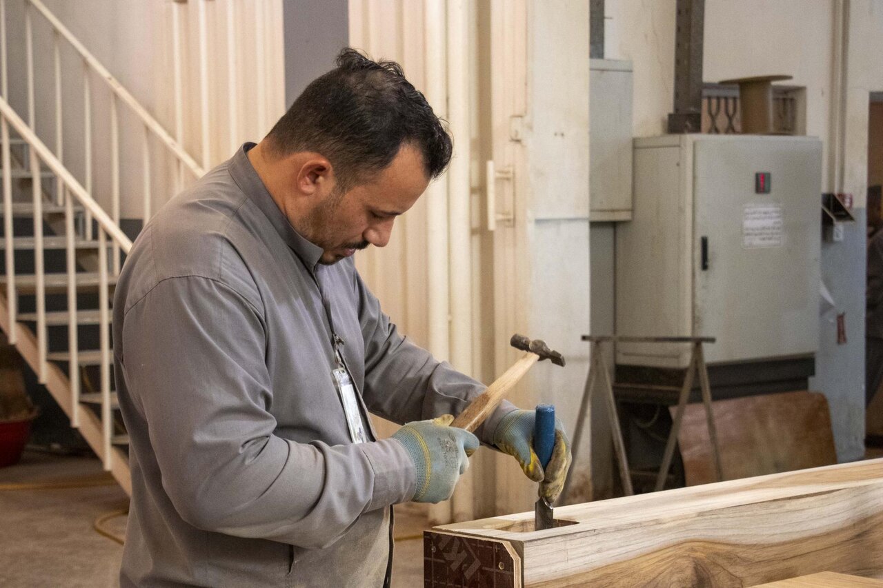fabricating a new door for the sanctuary of the shrine of Aba al-Fadl